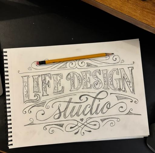 The LIFE Design Studio lettering, sketched in pencil
